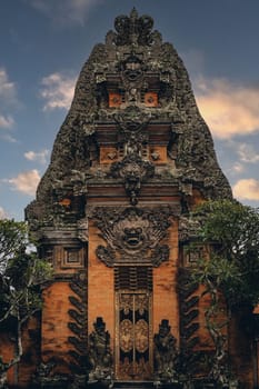 Ubud sacred hinduism religion temple. Traditional curved stone bali architecture