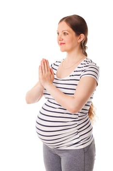 Pregnancy yoga exercise - pregnant woman doing asana Tadasana namaste - Mountain pose with salutation isolated on white background