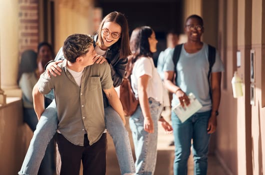 School, university or funny students in college joke as happy friends on lunch break outside of a learning classroom. Education, piggy back or excited girl walking with a romantic boyfriend on campus.