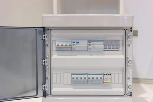 Electrical panel - white open voltage switchboard. Mid shot