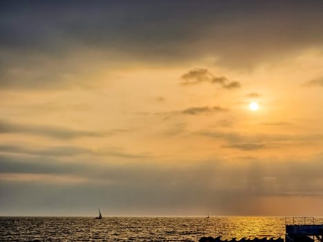 Sunset or sunrise sky clouds over sea sunlight in Phuket Thailand Amazing nature landscape seascape Colorful sky background