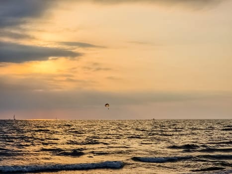 Sunset or sunrise sky clouds over sea sunlight in Phuket Thailand Amazing nature landscape seascape Colorful sky background