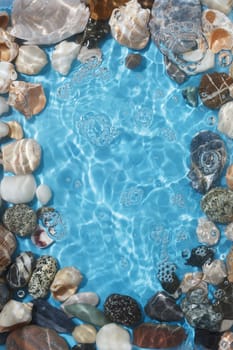 background from sea stones and water. copy space,vertical photo