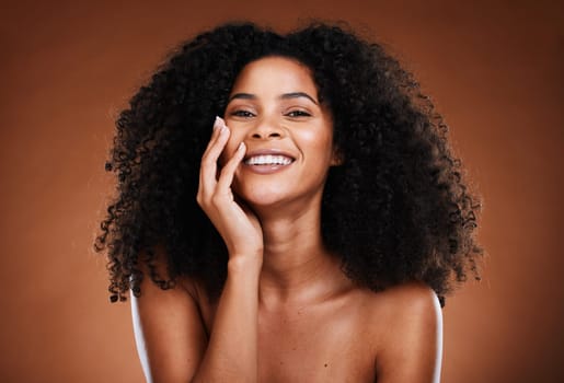Black woman, hair and portrait with natural beauty smile for healthy cosmetic satisfaction. Beautiful, confident and happy face of skincare girl with afro hair care texture in brown studio