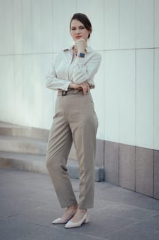 Caucasian woman in office or business fashion style in clothes.