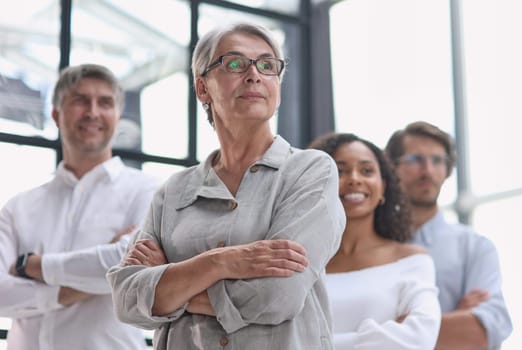 a group of pensive business people looking into the distance