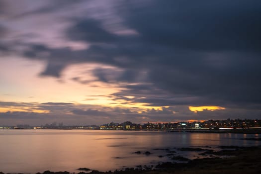 Sunset in the coastal street called Rambla in Montevideo capital of Uruguay