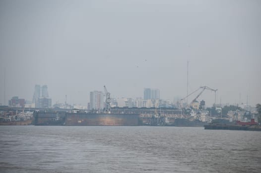 Buenos Aires, Argentina : April 21, 2023 : Foggy day with ships moored in the port of Buenos Aires in April 2023.