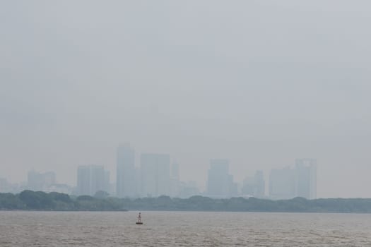 Building Silhouette On a foggy day in the port of Buenos Aires on a rainy day.