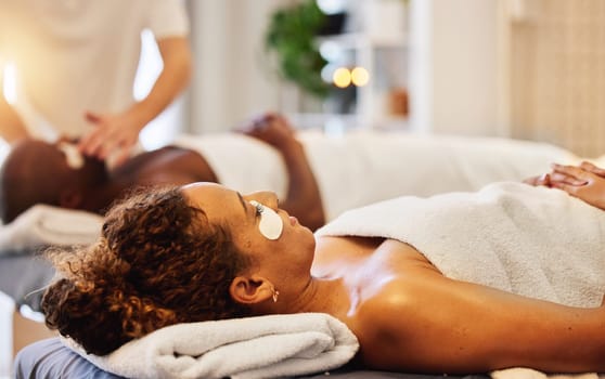 Wellness, facial and massage for couple in spa for relaxation, stress relief and wellbeing. Beauty, skincare and black couple in luxury beauty salon with cosmetic eye mask on for romantic holiday.