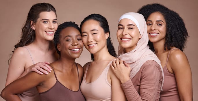 Diversity, women and beauty with skincare and portrait, smile and happy models, different and empowerment with motivation against studio background. Inclusion, equal and gender with culture and skin