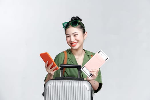 Tourist Asia girl having exciting travel promotion offer.
