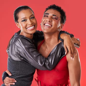 Portrait, fashion and friends hug, smile and creative with trendy, stylish and edgy outfits with studio background. Face, black woman and happy man embrace, happiness and joyful with artistic clothes.