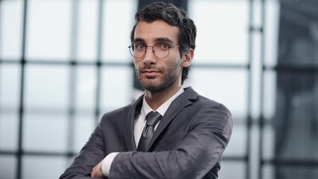 Handsome business CEO executive business man with crossed arms