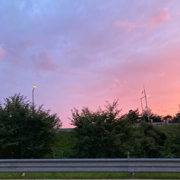 atmosphere,cloud,daytime,evening,morning,road,sky,tree,wind