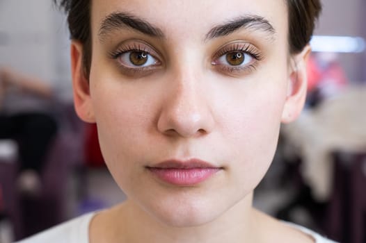 Portrait of a caucasian woman after eyelash lamination procedure