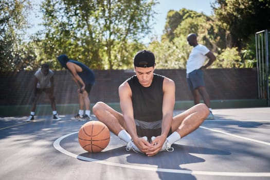 Basketball, man and meditation with yoga, zen and calm mindset before training, exercise or game outdoor. Fitness, workout and wellness young gen z basketball player spiritual and meditate on court.