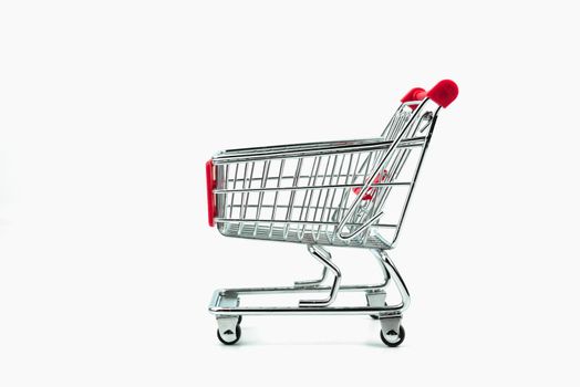 close up of shopping cart isolated on white background