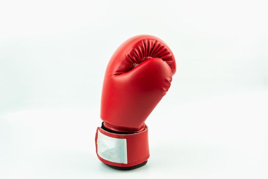 Red leather boxing gloves isolated on white background