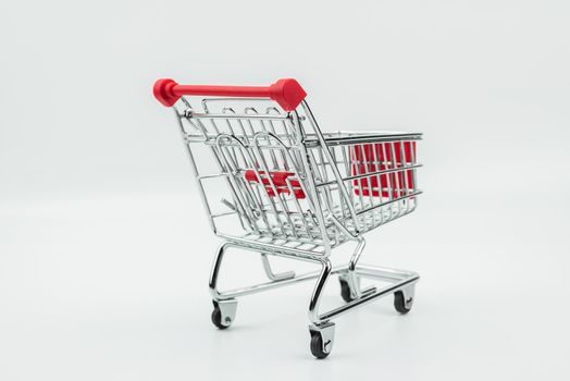 close up of shopping cart isolated on white background