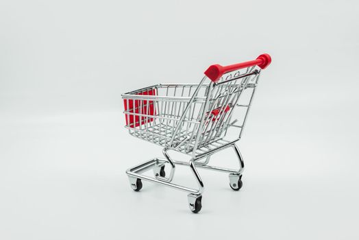 close up of shopping cart isolated on white background