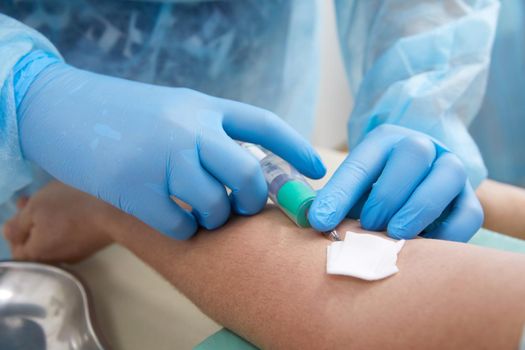 Nurse doing blood test from vein. Covid testing concept
