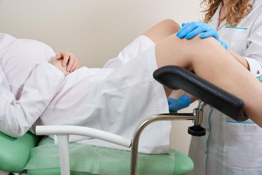 woman patient with gynecologist during the consultation in the gynecological office