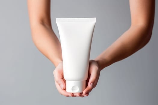 woman hands holding cosmetic cream white plastic tube mockup front view. Hand cream bottle. AI Generative