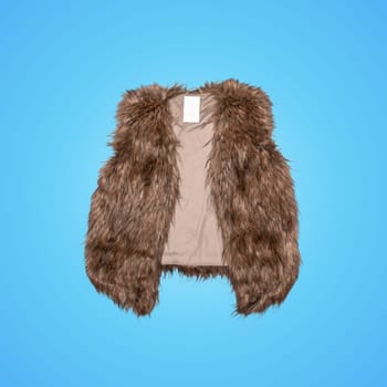 fur vest women isolated on blue background
