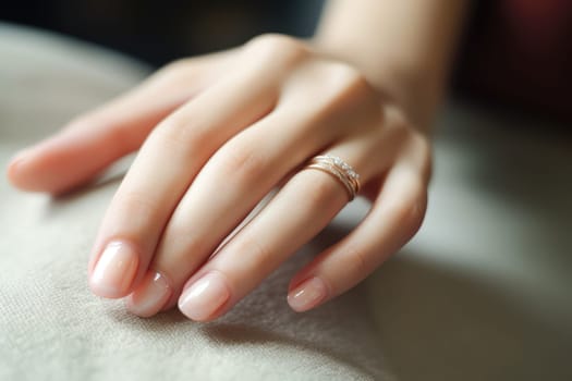 Closeup of woman hand with perfect nude manicure. AI Generated