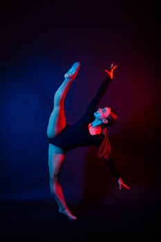 Full length portrait of plump woman doing physical exercise, jump, white and black background.