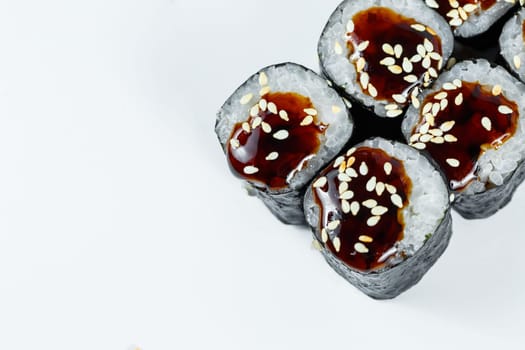 Japanese traditional food. Sushi rolls with fresh tuna avocado and cream cheese and soy sauce
