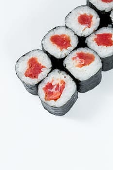 Japanese food. Rolls with red fish, fresh rice with eel, wrapped in nori.