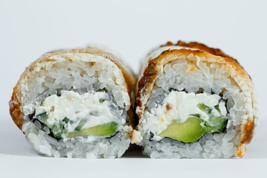 Japanese traditional food. Sushi rolls philadelphia classic with fresh eel and cream cheese and caviar