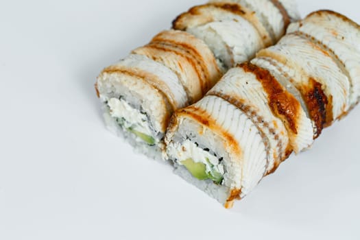Japanese traditional food. Sushi rolls philadelphia classic with fresh eel and cream cheese and caviar
