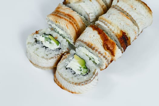 Japanese traditional food. Sushi rolls philadelphia classic with fresh eel and cream cheese and caviar