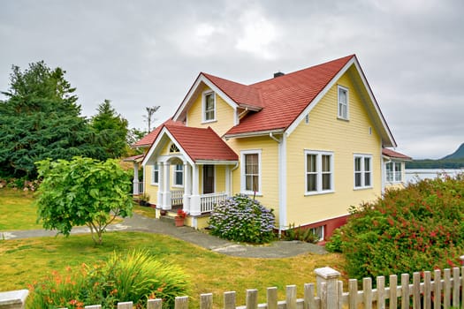 Luxury residential house at waterfront on Pacific ocean bay of Vancouver island