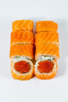 Japanese traditional food. Sushi rolls philadelphia classic with fresh salmon and cream cheese and caviar