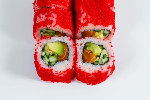 Japanese traditional food. Sushi rolls philadelphia with fresh avocado caviar and cream cheese