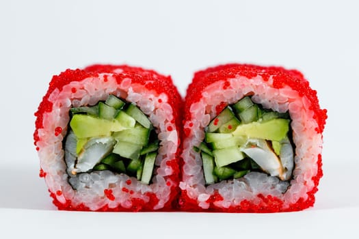 Japanese traditional food. Sushi rolls philadelphia with fresh avocado caviar and cream cheese