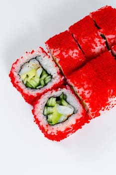Japanese traditional food. Sushi rolls philadelphia with fresh avocado caviar and cream cheese
