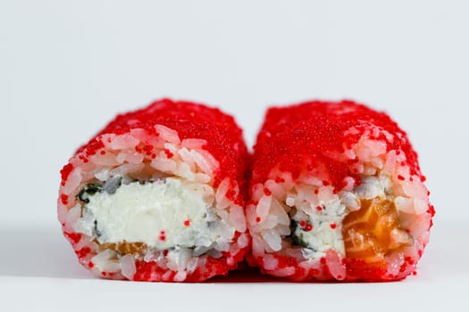 Japanese traditional food. Sushi rolls philadelphia with fresh avocado caviar and cream cheese