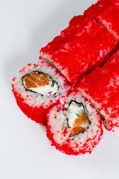 Japanese traditional food. Sushi rolls philadelphia with fresh avocado caviar and cream cheese