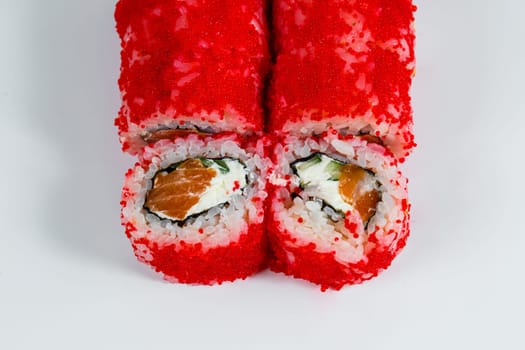 Japanese traditional food. Sushi rolls philadelphia with fresh avocado caviar and cream cheese