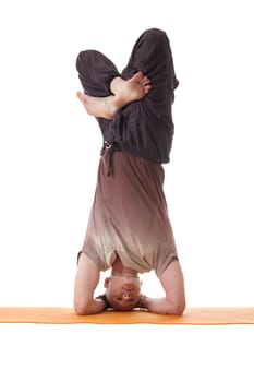 Image of muscular man posing standing on his elbows