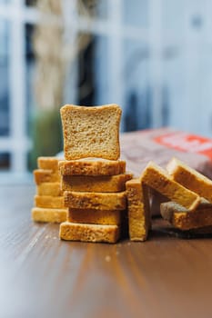 Fresh croutons made of whole grain flour, golden in color. Toasts for delicious sandwiches