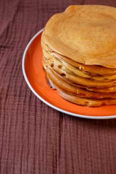Delicious homemade fried pancakes with natural ingredients, plate with homemade pancakes
