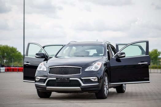 Modern black car, black SUV jeep on big wheels