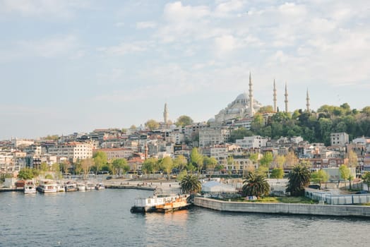 Istanbul, Turkey, May 02, 2023: View of the mosque in cloudy weather over the Bosphorus and Kadika