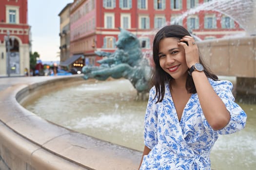 Beautiful young mixed race woman at Place Massena in Nice